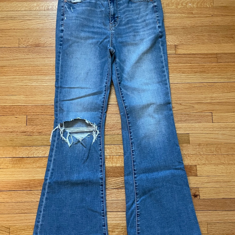 AE stretch flare ripped blue jeans